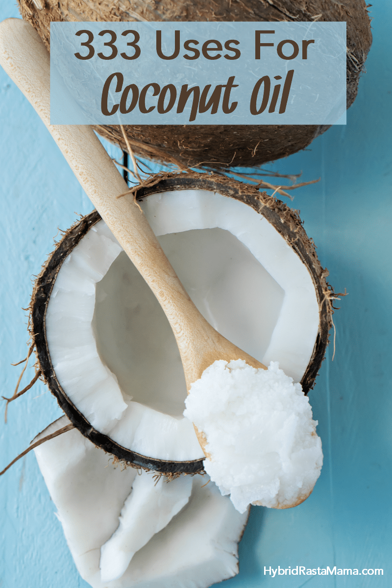 A coconut half with a wooden spoon laying across it. There is coconut oil on the spoon in a solid state. There is a teal background and the words "333 uses For Coconut Oi' - The Ultimate Guide On How To Use Coconut Oil."