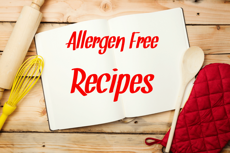 Allergen free recipes written on a cookbook that is opened to the center page