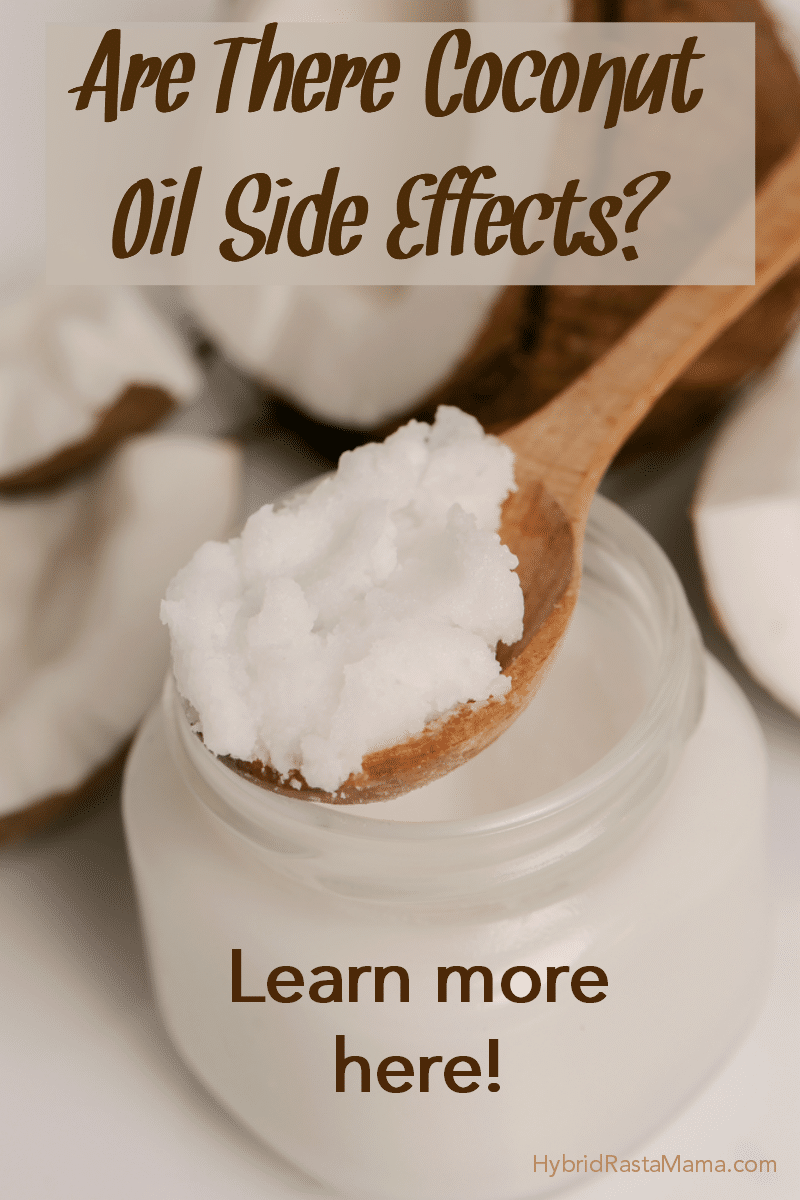 A jar of coconut oil with a wooden spoon full of it.