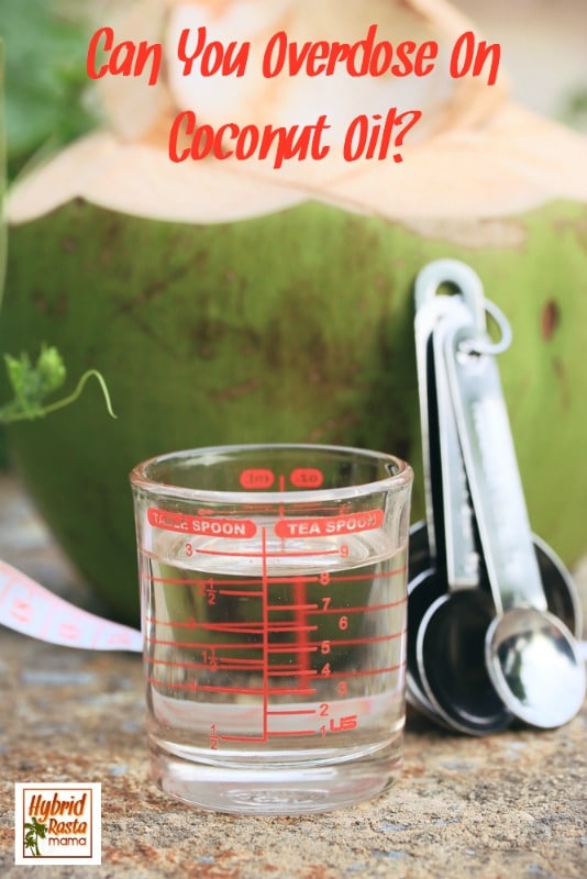 A measuring cup of coconut oil and measuring spoons next to it. 