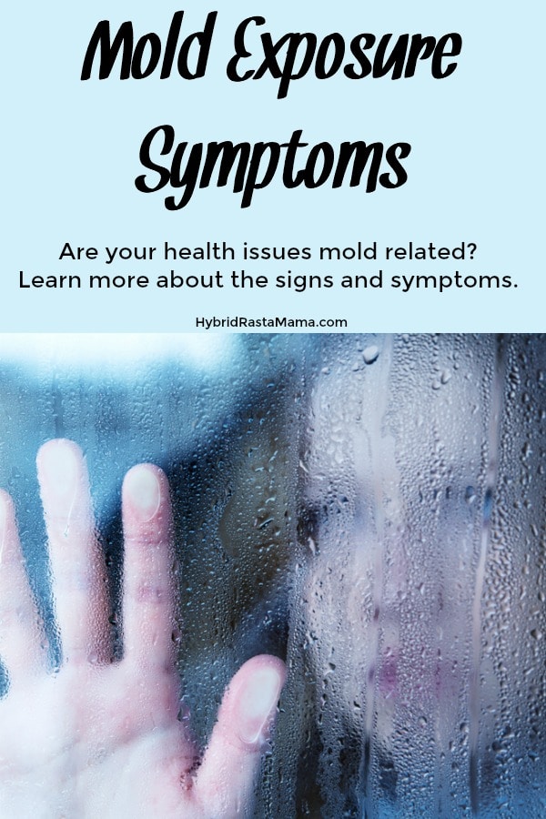 A woman with her hand pressed against a rainy window pain. She has mold exposure symptoms but idn't sure what to do.