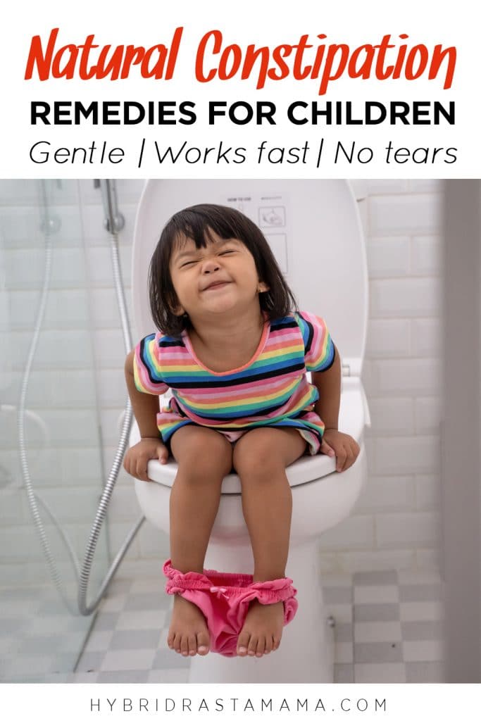 A constipated young girl on the toilet