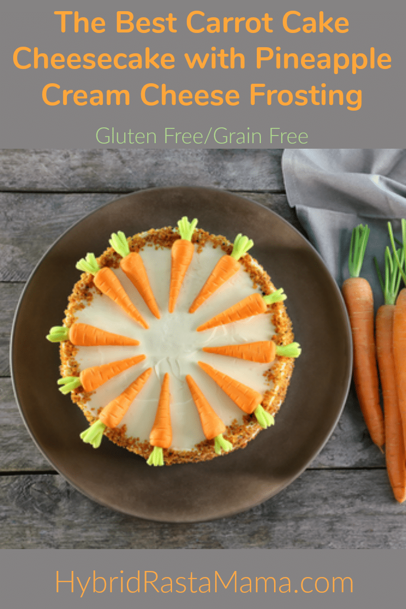 A gluten free carrot cake cheesecake with pineapple cream cheese frosting on a white plate