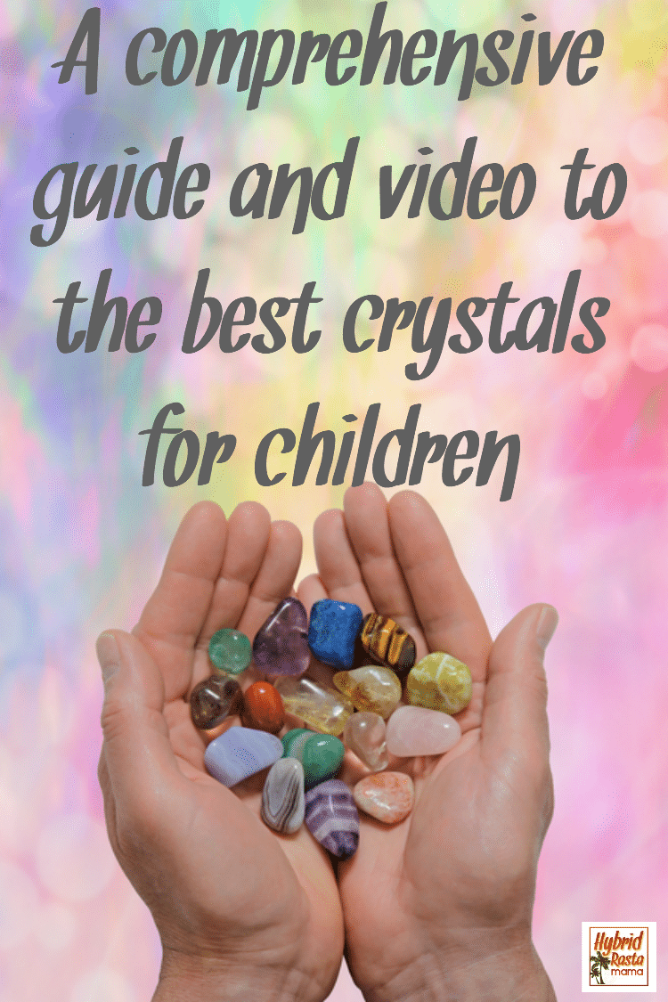 A whimsicle background with two hands holding various healing crystals for children and adults